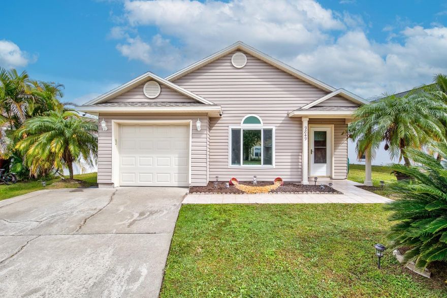 Introducing a captivating gem of a home that's sure to steal your heart! Nestled in a serene neighborhood, this 3/2 haven with a 1-car garage is a true masterpiece. With an array of recent updates, it exudes modern comfort and style.

Step inside, and you'll be greeted by the subtle charm of a home that's been thoughtfully renovated to perfection. The roof, replaced in 2018, offers peace of mind for years to come. In 2020, a new Trane air conditioner and new duct work were installed, providing efficient cooling, and the installation of double-pane high-impact windows throughout the home ensures tranquility and energy efficiency. But that's not all – the property boasts new vinyl siding, and high-impact double-paned French doors leading to the back patio, as well as new front, back, and garage doors installed in 2021.

Both bathrooms were treated to a stunning makeover in 2021, showcasing the home's commitment to elegance. A vinyl fence encloses the property for added privacy, and a tankless water heater guarantees endless hot showers. The kitchen, a chef's dream, boasts sleek granite countertops and state-of-the-art stainless steel Samsung appliances.

Conveniently located near top-rated schools, shopping centers, dining options, and major highways, you'll find that this home's location is simply unbeatable. With vaulted ceilings and an open floor plan, every corner of this space feels inviting and spacious. The ensuite bedroom features his and her closets, one of which is a walk-in, offering a touch of luxury to your daily routine.

This home isn't just a place to live; it's a lifestyle upgrade waiting to be embraced. Don't miss out on the opportunity to make this exquisite property your very own. Call today to schedule your viewing and experience the magic of this exceptional residence!