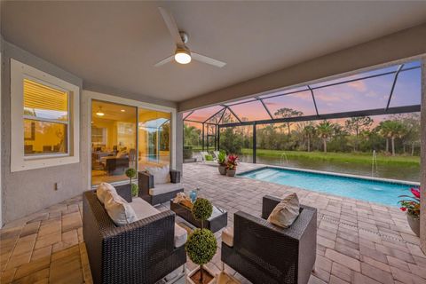 Photo of 5617 Long Shore Loop, Sarasota, FL 34238 (MLS # A4684355)