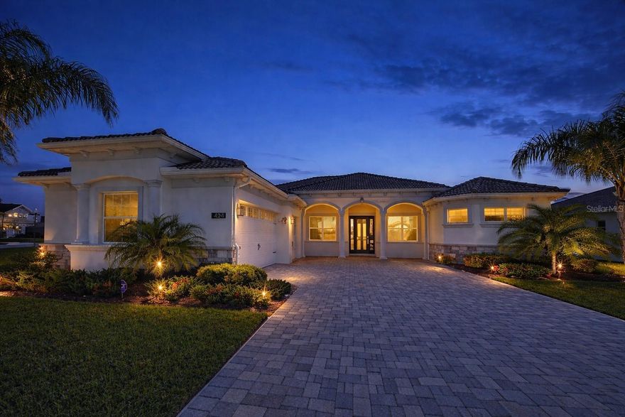 LIVE LIKE A CHAMPION! FULL GOLF MEMBERSHIP INCLUDED IN HOA!
Priced to sell and positioned on one of the largest corner home sites in ChampionsGate Country Club, this Stockton Grande delivers what most buyers are actually looking for—space, privacy, and a premium setting. With separation on both sides, no tight neighbors, and peaceful water views with a lighted fountain backdrop, this is a lot that truly stands apart.
This 4-bedroom, 3-bath home offers over 3,000 square feet of single-story living with a layout that just works. Open where it should be open, with a natural flow from the entry into the main living space, connecting the great room and kitchen seamlessly for both everyday living and entertaining. A wide paver driveway leads to a true three-car garage, giving you the kind of parking and flexibility most homes in here simply don’t have.

Inside, you’ll find tile throughout the main living areas, quartz countertops, and clean, modern finishes that keep the home feeling sharp without overdoing it. The corner positioning brings in great natural light while still giving you that added layer of privacy.
The primary suite is a true showstopper—spacious, private, and anchored by a spa-like bathroom featuring dual vanities, a soaking tub, and a large walk-in shower that feels like your own personal retreat.
Step outside and it’s quiet. Water, conservation, and room to breathe—this is where the lot really pays off.
Set within a true golf cart-friendly community, you can roll straight from your driveway to golf, dining, and amenities. With home ownership in ChampionsGate, you receive full membership access to a true resort-style lifestyle, including seven pools throughout the community, water slides, lazy rivers, and multiple clubhouse experiences. The Oasis Club, The Plaza (featuring a $75/month food & beverage credit), and The Retreat Club offer everything from dining and entertainment to social events and family-friendly amenities. You’ll also enjoy 24-hour access to a state-of-the-art fitness center at The Plaza.
The HOA covers full golf membership, lawn care, gated security, cable, high-speed internet, and phone, with CDD and trash included in your taxes—creating a true low-maintenance, resort-style lifestyle just minutes from Orlando’s top attractions, dining, shopping, and entertainment.
Same floor plan everyone wants—just on a lot that actually makes it worth it. Schedule your private showing today.