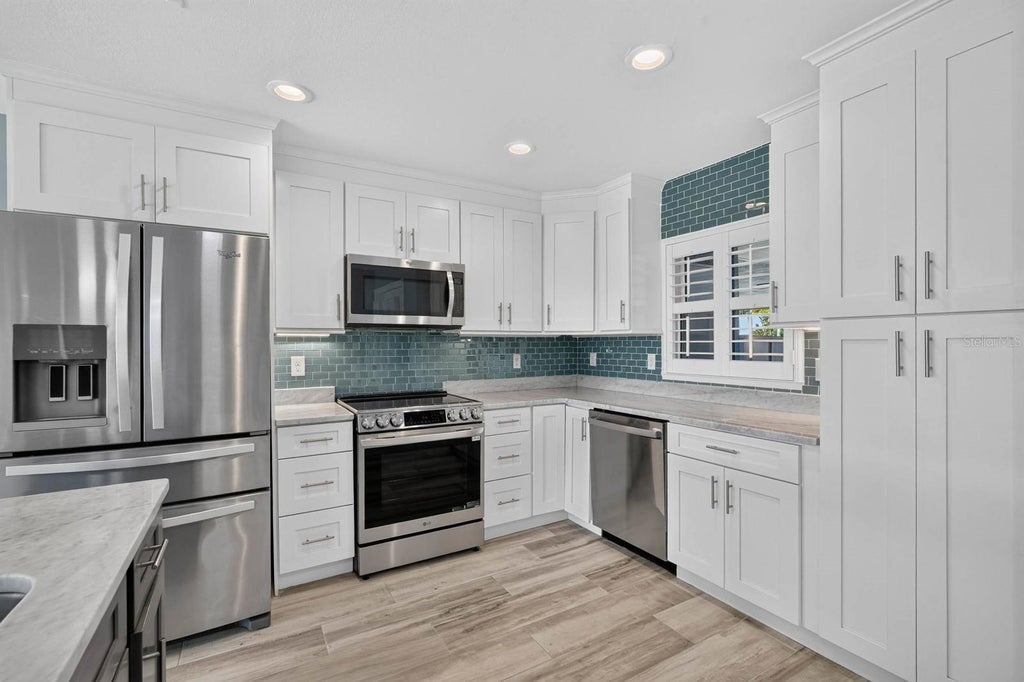 Photo of 1136 Harbour Point Drive, Port Orange, FL 32127 (MLS # V4949889)