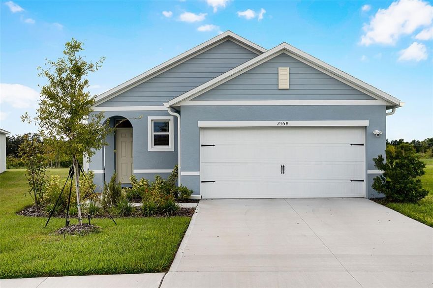 Welcome to this modern and well-maintained 3-bedroom, 2-bathroom home located in the desirable community of Harmony on Lake Eloise. This 2024-built rental offers both comfort and style, perfect for those seeking a spacious and functional layout.

Step inside through a welcoming foyer that flows into the dining area and open-concept living room—ideal for entertaining or relaxing after a long day. The contemporary kitchen features stainless steel appliances, a breakfast bar with extra seating, and stylish tile flooring throughout the main living areas.

The split-bedroom floor plan provides added privacy. The primary suite is located at the rear of the home and includes a large walk-in closet and a spa-like bathroom with dual vanities and a stand-alone shower. At the front of the home, you’ll find two additional bedrooms and a full bathroom with a shower/tub combo—perfect for family or guests.

Enjoy the best of Florida living with sliding glass doors that open to a screened patio, overlooking a fenced backyard—great for outdoor dining, relaxing, or playing.

Located just minutes from world-class theme parks, shopping, dining, and attractions, Harmony on Lake Eloise offers a vibrant lifestyle in a prime location.