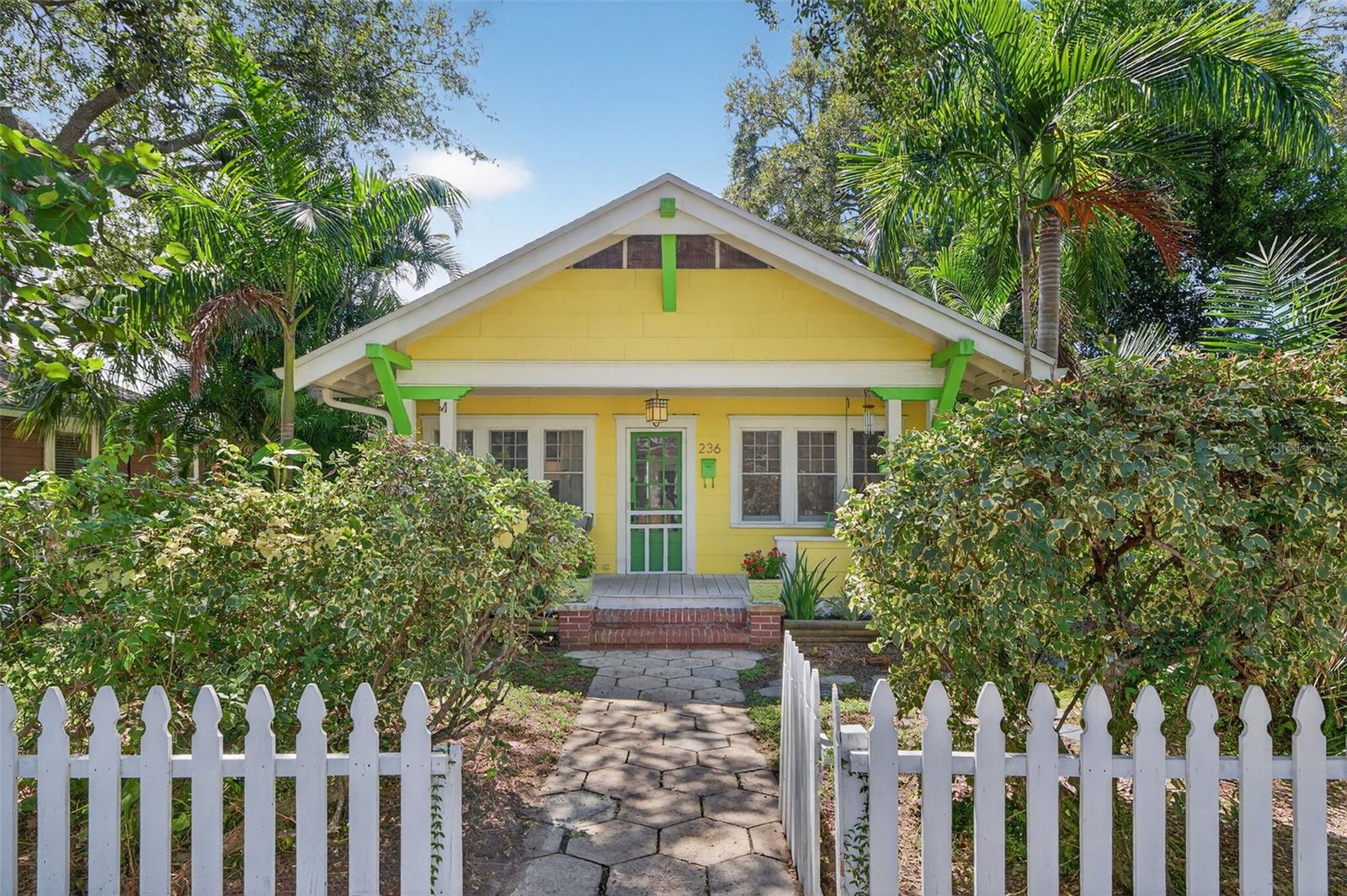 Best value in Historic Old Northeast! 236 21st Ave N is a charming 2 bathroom, 1.5 bathroom, bungalow with the backyard of your dreams. A perfect blend of character with modern updates in one of St. Pete’s most coveted neighborhoods. Fresh interior paint, new landscaping, and soaring ceilings create a bright, welcoming feel, while a decorative fireplace adds historic charm. Out back, your heated pool and spa with a travertine paver deck, Pentair gas heater, and outdoor shower set the stage for year-round enjoyment. The detached garage makes an ideal yoga studio, office, or creative space. Recent updates include a 2019 roof, some newer windows, updated 200-amp electrical panel, gas tankless water heater, and a convenient laundry/half bath in the garage. Cook with ease on the gas range, then relax in your private backyard oasis. All this just minutes to downtown St. Pete, waterfront parks, and the charm of Historic Old Northeast. Don’t miss this one—it’s the best value in the neighborhood!
