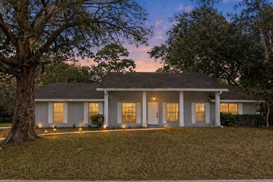 Nestled within the coveted community of Sweetwater Oaks, this exceptional lake-access residence offers the perfect blend of refined luxury, timeless design, and resort-style living. Situated on a beautifully landscaped and fully fenced .32-acre homesite, this meticulously updated 4-bedroom, 2.5-bath pool home with a spacious 2-car garage makes an unforgettable first impression with its striking curb appeal and lush tropical surroundings. Inside, an airy open-concept floorplan is enhanced by wide-plank luxury vinyl flooring, abundant natural light, and thoughtfully curated finishes throughout. Designed with both entertaining and everyday comfort in mind, the chef-inspired kitchen features sleek quartz countertops, stainless steel appliances, generous cabinetry, and picturesque views overlooking the sparkling pool and outdoor living spaces. The spacious primary suite serves as a private sanctuary, complete with a spa-caliber ensuite bath showcasing an oversized designer-tiled walk-in shower with dual shower heads for a true retreat experience. Additional bedrooms are generously sized and filled with natural light, creating warm and inviting spaces for family and guests alike. Expansive sliding glass doors seamlessly connect the indoor living areas to a screened lanai and private backyard oasis. Whether hosting gatherings, relaxing poolside, or enjoying peaceful Florida evenings, the outdoor setting delivers the ultimate backdrop for year-round enjoyment. Residents of Sweetwater Oaks enjoy an unmatched lifestyle centered around private access to Lake Brantley and the exclusive Sweetwater Beach park. Community amenities include boating, skiing, sailing, kayaking, fishing, tennis courts, pickleball courts, sand volleyball, playgrounds, and a vibrant community center hosting events throughout the year. Nearby, Riverbend Park offers additional outdoor recreation with scenic nature trails, sports fields, kayaking and canoe launches, and direct access to the beautiful Wekiva River. Ideally located within the highly sought-after school district for Sabal Point Elementary School, Rock Lake Middle School, and Lake Brantley High School, this remarkable home presents a rare opportunity to experience elevated living in one of Central Florida’s most established and desirable communities.