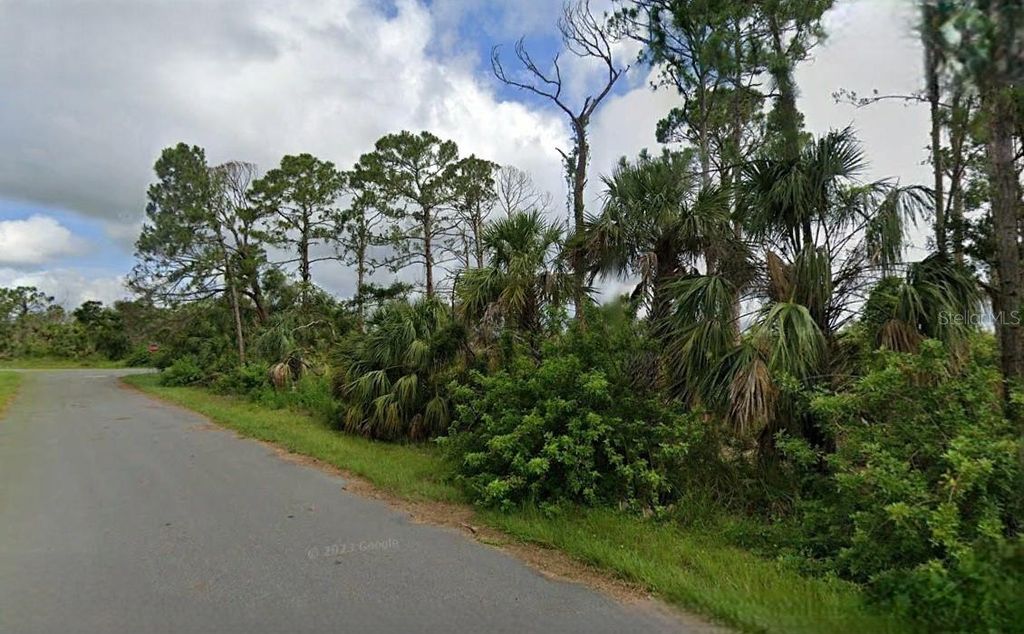 Photo of 15484 Whitehall Avenue, Port Charlotte, FL 33953 (MLS # O6328159)