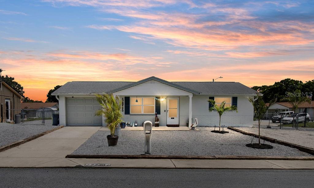 Charming and move-in ready, this 2-bedroom, 1-bathroom single-family home sits on a beautifully landscaped corner lot with new palm trees and low-maintenance granite rock accents. Located in a peaceful, well-established neighborhood with no HOA, this property offers both privacy and freedom. The freshly painted exterior adds great curb appeal, while the interior provides cozy, functional living space—perfect for anyone seeking a Florida lifestyle without the upkeep. You'll also enjoy plenty of off-street parking, making it easy to accommodate guests or multiple vehicles. Conveniently close to parks, shopping, and dining, this gem combines comfort, value, and location. Don’t miss your opportunity—schedule a showing today!