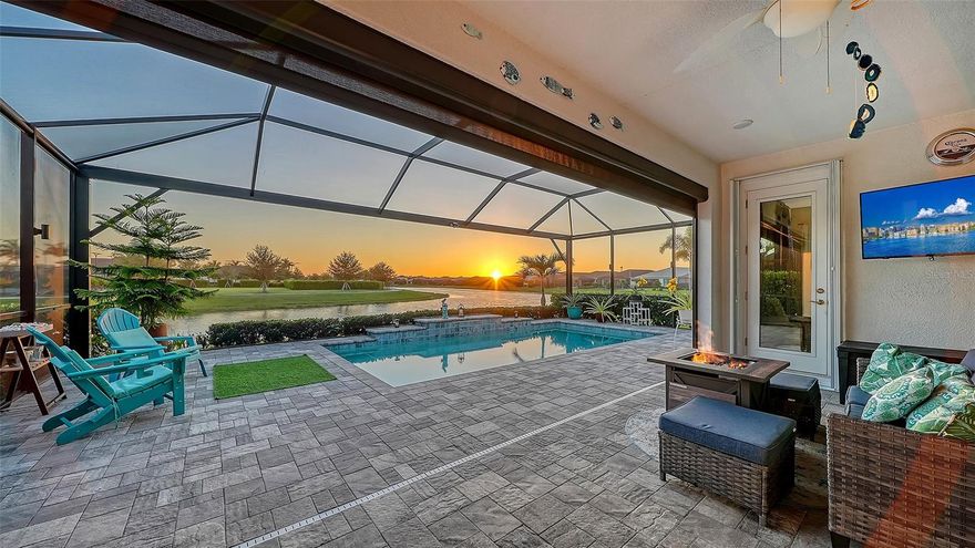Experience unparalleled luxury in this meticulously upgraded 3-bedroom, 3-bath sanctuary in the premier 55+ community of Cresswind.  Offered partially furnished, this open-concept masterpiece is a designer's dream, featuring a GOURMET KITCHEN with a massive 16-foot island, upgraded cabinetry, a custom-built pantry, and double wall ovens with French doors.  The living area exudes sophistication with a built-in stone wall electric fireplace, custom accent walls, DESIGNER LIGHTING, upgraded flooring and shutters throughout.  Every detail has been considered, from the custom master closet to the privacy window film and electric rolling shades on the sliders.  Your private outdoor oasis awaits, featuring a remote-heated pool with custom lighting under a PANORAMIC CAGE, a privacy shade lanai, an electric awning, and pre-wiring for an outdoor kitchen and tv.  For ultimate peace of mind, this home includes a whole-house GENERAC GENERATOR accordion storm shutters, a full house gutter system, a whole-house alarm, a water filtration/softener system, and a UV air purifier.  The Cresswind lifestyle is world-class, offering a full-time lifestyle director, pickleball, tennis, bocce ball, walking trails, a dog park, resort-style and resistance pools, an event lawn, a fitness center, a yoga studio, and dedicated rooms for art, ceramics, and cards.  This is more than a home: it's a lifestyle without compromise.