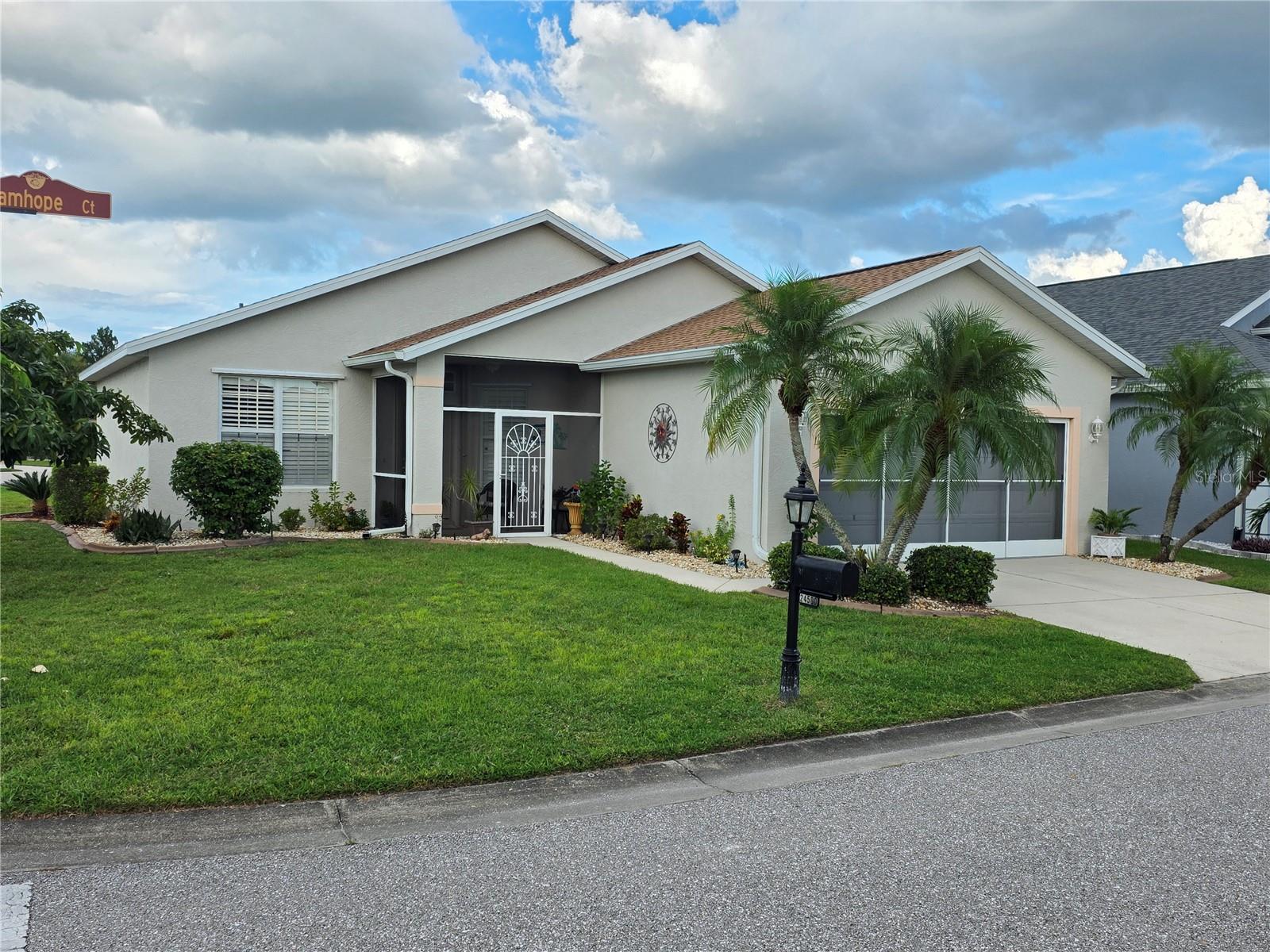 Welcome to Kings Gate community – This beautiful 2 bedroom and 2 bathroom split floor plan with
porcelain wood grain tile and white plantation shutters throughout the house. Home built 2005, 1269
SF. is a good size corner lot on Bramhope Court and Buckingham Way; when you enter the kitchen has
complete stainless steel appliances and granite counter. Den/office with a sleeper sofa, shares a
bathroom with tub for spare room for guest. From the living room you have access to full length lanai
(232 sf.) and right next to it is concrete paver patio (448 sf.) perfect space to entertain events. The
master suite with ensuite bathroom provides custom design walking closet; location of this master suite
is located in the end of the home providing privacy. Property is move in ready with or without furniture.
The Kings Gate community has options to keep you busy no matter your interests. There is an Olympic-
size pool and spa, tennis and pickle ball courts, 30,000 square foot clubhouse with a full service
restaurant, game room, computer room, fitness center with saunas/lockers, library and more! There is
also an 18-hole golf course open to the community and the public. The onsite Lion’s Den restaurant and
bar is convenient, or you can travel by golf cart to the shopping center, and restaurants. Charlotte
County has some of the most beautiful beaches in SW Florida not far from this community. Located in a
prime location for dining, parks, entertainment, airport, Sunseeker Resort, and Fisherman’s Village.
Make this your home or a great investment.