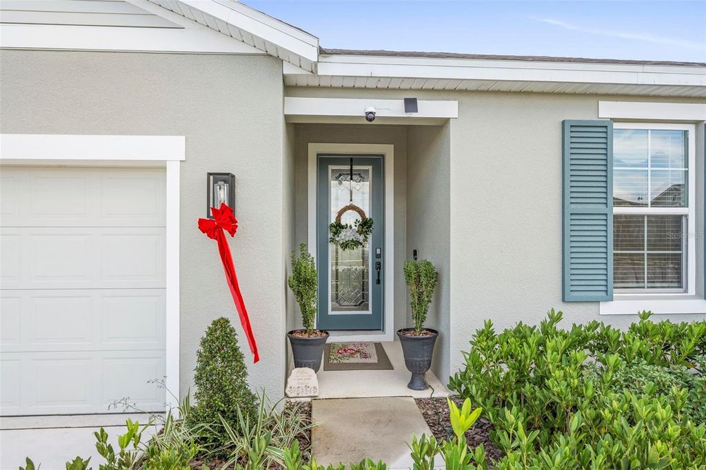 Photo of 608 Hennepin Loop, Lake Wales, FL 33898 (MLS # O6366576)