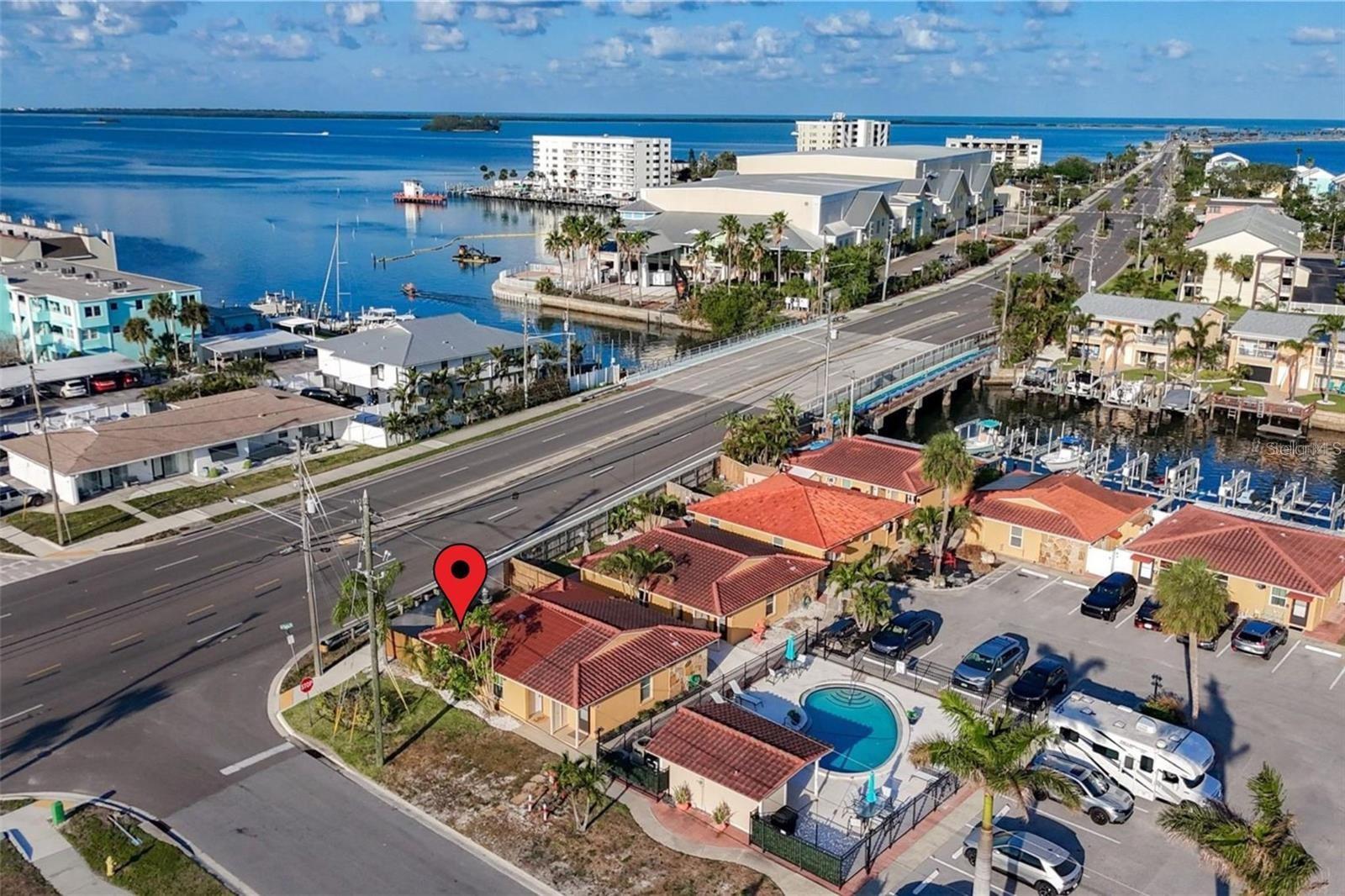 One or more photo(s) has been virtually staged. Tahitian Villas / Dunedin – Your Perfect Florida Rental Getaway!
This well-maintained 2-bedroom, 1-bath end-unit villa is located in a desirable waterfront community just minutes from the Dunedin Causeway and Honeymoon Island. The home is move-in ready and offers a flexible layout with a light-filled, open floor plan and tile flooring throughout for easy maintenance. The second bedroom features accordion doors, allowing the space to be used as a guest room, home office, or opened up for expanded living and entertaining. Step outside to enjoy one of the largest fenced yards in the community—complete with a private rear patio perfect for relaxing, dining outdoors, or giving pets room to roam. Recent updates include a brand-new HVAC system (2024), newer tile roof, updated windows, new front door, and new kitchen appliances—offering both comfort and peace of mind.
The community also features a sparkling pool and is ideally located near beaches, parks, restaurants like Frenchy’s Outpost, and charming shops in downtown Dunedin. There is a deeded boat slip that can be leased with this unit for an additional $250 per month.
This rental offers low-maintenance living in a vibrant coastal setting. Schedule your showing today and experience the best of Dunedin living!