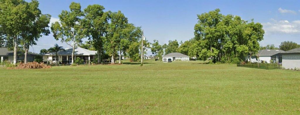 Photo of 25267 Alcazar Drive, Punta Gorda, FL 33955 (MLS # A4649875)