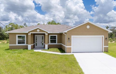 Photo of 437 Mercedes Court, Lehigh Acres, FL 33972 (MLS # TB8476671)
