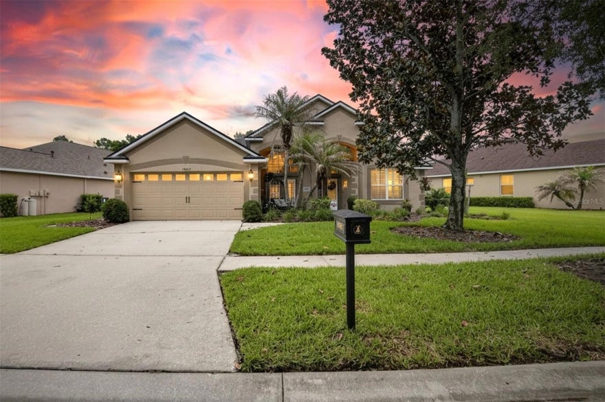 Welcome to this stunning home in the highly sought-after FishHawk Ranch community! Thoughtfully updated and meticulously maintained, this exceptional residence offers a blend of elegance, comfort, and functionality. The home features four bedrooms, two-and-a-half bathrooms, a formal living and dining room combination, a spacious eat-in kitchen with breakfast nook, and a versatile upstairs bonus room. A 2022 remodel transformed the interior, showcasing elegant tile flooring throughout the main level, hardwood flooring on the staircase and bonus room, fresh interior paint, updated lighting fixtures, ceiling fans, sinks, toilets, cabinetry, and designer hardware. The primary suite boasts a completely remodeled spa-inspired bathroom featuring custom cabinetry, quartz countertops, illuminated mirrors, a breathtaking floor-to-ceiling tiled walk-in shower, a freestanding soaking tub, and a stylish glass-paneled pocket door. The chef’s kitchen is truly the heart of the home and was extensively remodeled in 2022. Highlights include custom cabinetry, a striking tiled accent wall, a dual gas/electric range, pot filler, upgraded lighting, and a spacious walk-in pantry with abundant storage and a dedicated microwave station. A charming coffee bar complete with a wine refrigerator adds both convenience and style. Step outside to your private outdoor retreat. Added in 2023, the beautifully designed paver lanai features a custom outdoor fireplace and overlooks a serene conservation area, providing the benefit of no rear neighbors. Plantation shutters throughout the home, including the sliding glass doors—add elegance and privacy. Ideally located within walking distance of FishHawk Square and many community amenities, residents enjoy access to resort-style pools, parks, trails, fitness facilities, and top-rated schools.
This remarkable home has been lovingly cared for and thoughtfully upgraded throughout. With too many features to list, it truly must be seen in person to be fully appreciated. Schedule your private showing today!