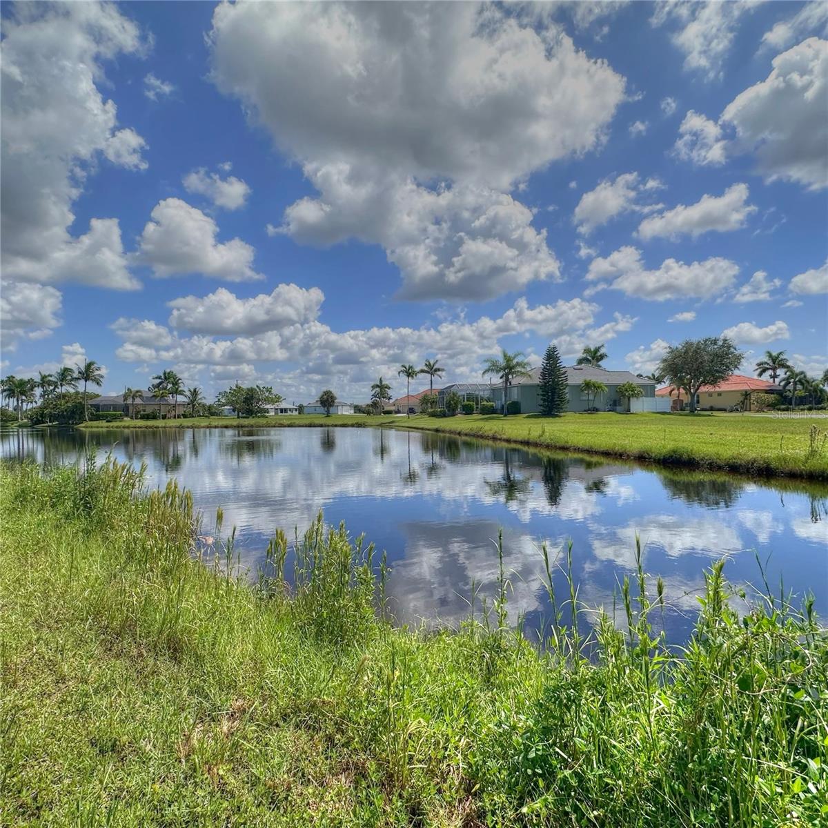 LAKEFRONT! WIDE WATER VIEW!! SOUTHEAST REAR EXPOSURE! ON QUIET CUL DE SAC!! Live in the desirable community of BURNT STORE LAKES! The perfect setting to build your custom dream home right on the wide elbow of a small lake! BURNT STORE LAKES deed-restricted community is rapidly developing and featuring 11 freshwater lakes, kayak/canoe launch with access to peaceful Charlotte Harbor and Stork Lake Park. Residents and friends enjoy gathering at the picnic pavilion. To the north is Pirate Harbor. to the south is Burnt Store Marina! Take advantage of public amenities including a 27-hole golf course, the largest marina in SW Florida with gulf access boating & fishing, fitness and tennis facilities, plus both waterfront and golf-side dining. BURNT STORE LAKES COMMUNITY is surrounded by natural Florida style beauty and abundant wildlife. Enjoy fishing, bird watching, and the peaceful environment that makes Burnt Store Lakes unique. Entertainment is abundant in the quaint downtown Punta Gorda with boutiques, restaurants, galleries, parks, live music, gatherings, markets, festivals. Only a 15-minute drive to Punta Gorda Airport! CITY WATER AND SEWER IN PLACE! LOW ANNUAL FEES!!