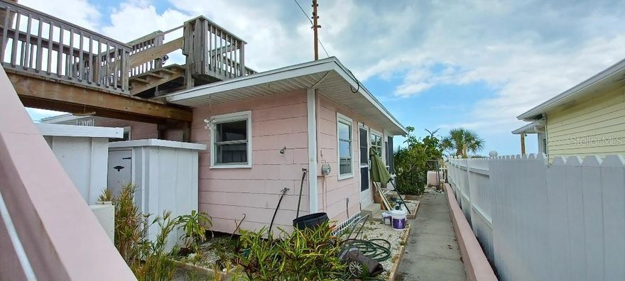 Tiny living on the sand! Beach frontage directly on the Gulf in Treasure Island. The cottage is behind a 2 story house which is occupied by the owner. The beach is your backyard with amazing sunsets over the Gulf. This two bedroom, one bathroom cottage is a rare find. It even has an attached screened porch. Upper deck is shared with the owner. Washer/dryer is shared with the owner,  Long term rental only.