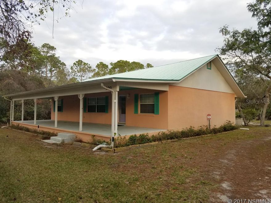 Super large 2 bedroom, 2-bathroom pool home with HUGE garage/workshop on more than a 1/2 acre with lots of privacy and comfort. Features Florida-style front porch, solar-heated pool and views of the woods all around. Open concept floor plan with spacious kitchen and big pantry. Master suite has a jetted tub, walk-in shower and walk-in closet. Guest bedroom has Murphy bed and can double as an office with plenty of built-ins. Garage has extra high ceilings and includes it's own a/c unit. ;Water: City