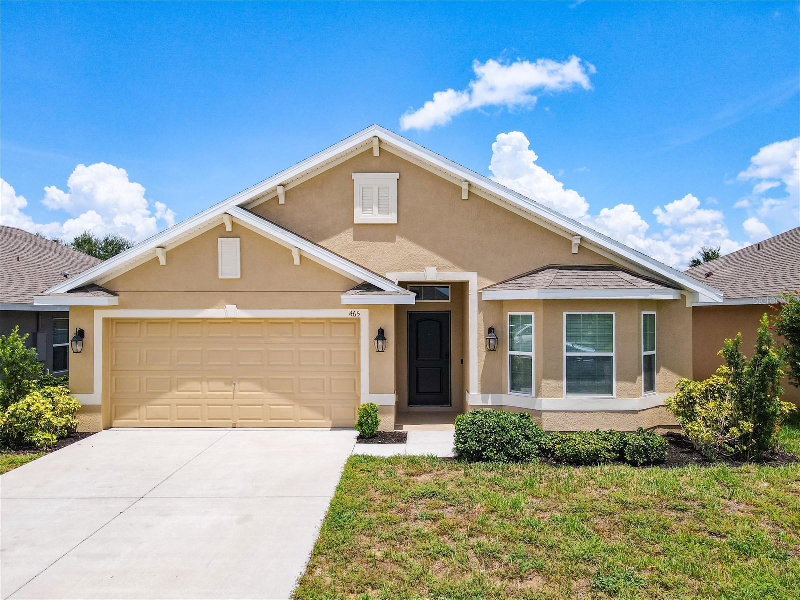 Welcome home to Northridge Estates!!! This charming, move-in-ready house features three bedrooms, two bathrooms, and a two-car garage. Enjoy outdoor living with a back porch and an extended patio. The home comes fully equipped with a washer, dryer, refrigerator, stove, dishwasher, microwave, and window blinds. Inside, you will find laminate wood-like flooring throughout all the bedrooms, and ceramic tile in the social areas and bathrooms. The interior and exterior have been freshly painted, and the property is surrounded by mature landscaping.
Located in the vibrant and growing city of Davenport, this well-maintained home offers the perfect blend of comfort and convenience. The open-concept layout includes a spacious living area that seamlessly connects to the dining space and kitchen, creating an inviting atmosphere for entertaining or relaxing. Enjoy Florida’s beautiful weather on the covered porch and extended patio, ideal for enjoying morning coffee or evening gatherings. The primary suite offers ample closet space and a private bathroom, while the other two bedrooms are perfect for a growing family.
Nestled in a friendly community and just minutes away from local shops, dining, and outdoor activities, this house offers tranquility along with easy access to community amenities. Make this lovely home yours and experience the best of Davenport living!