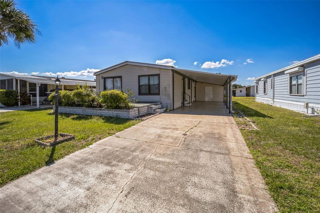 Photo of 65 Joppa Drive, Winter Haven, FL 33884 (MLS # TB8461942)