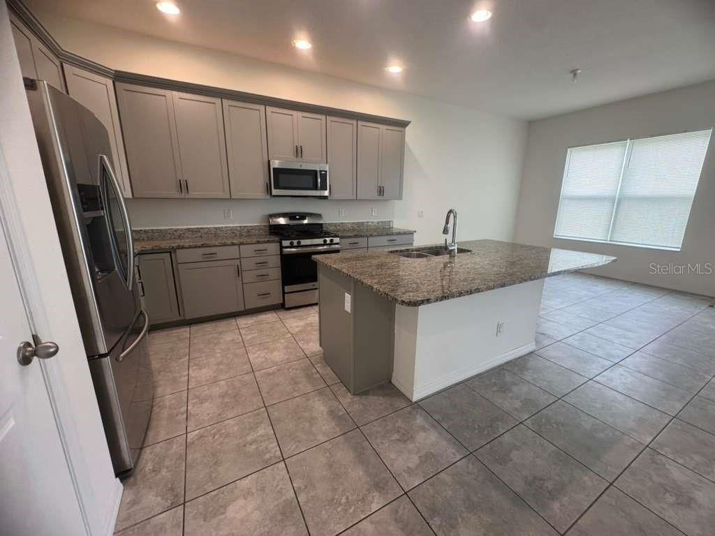 Photo of 998 Grand Hilltop Dr, Apopka, FL 32703 (MLS # O6406648)
