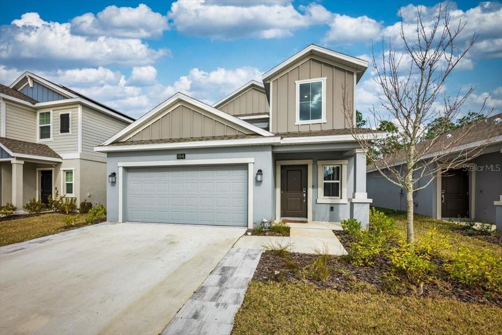 Photo of 1114 Cabot Cliffs Drive, Daytona Beach, FL 32124 (MLS # S5142026)