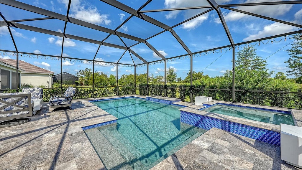 Photo of 8542 Frangipani Terrace, Sarasota, FL 34240 (MLS # A4697227)