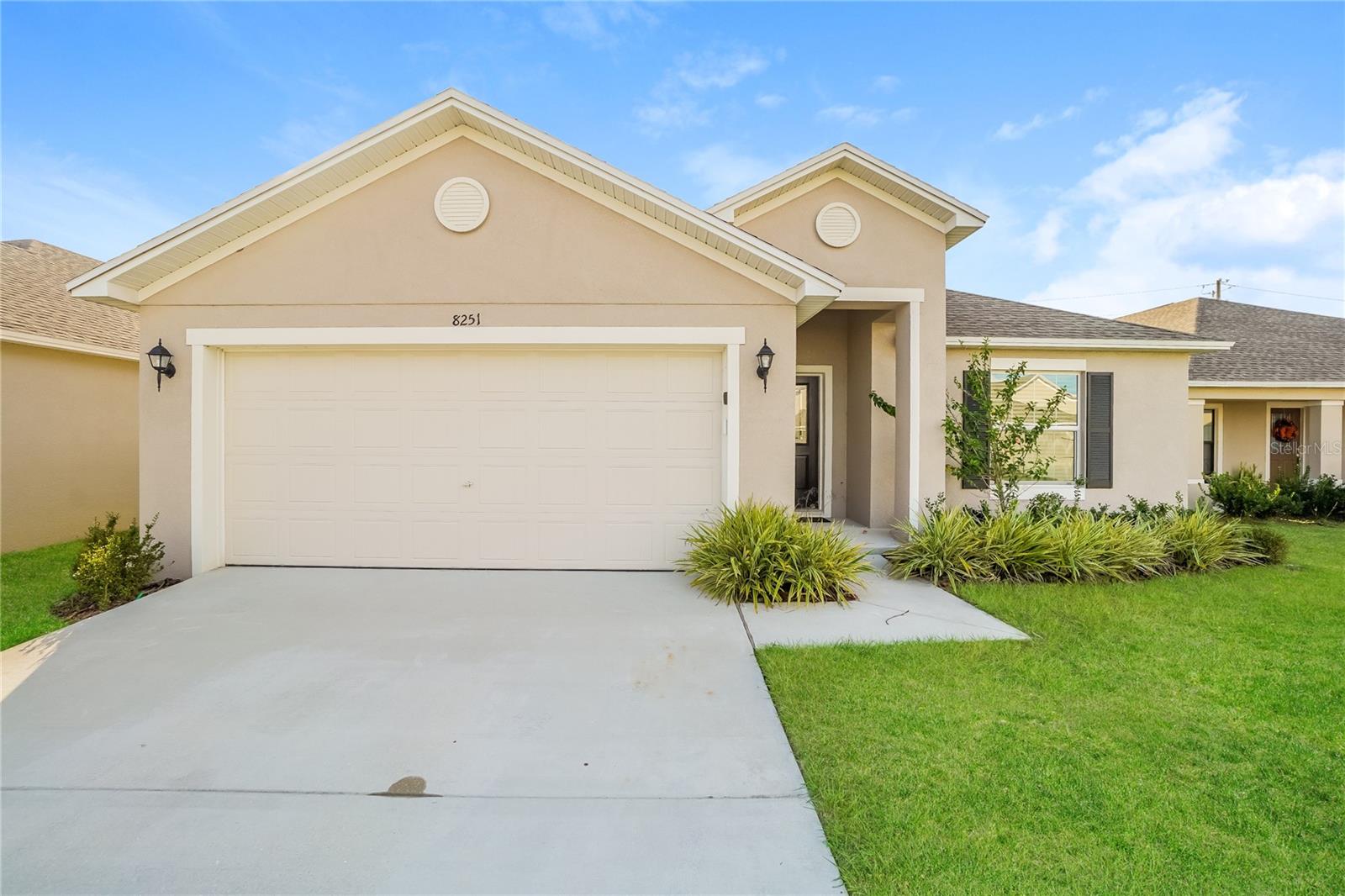 Discover this inviting 3-bedroom, 2-bathroom pet-friendly home spanning 1,266 sq ft. The kitchen is equipped with stainless steel appliances, including a refrigerator, microwave, and range oven, complemented by modern window coverings. The living area features ceiling fans for added comfort. The primary bathroom includes a bathtub, while the exterior showcases a fenced yard and a convenient attached garage. This home is ready for your personal touch. Schedule a tour today!