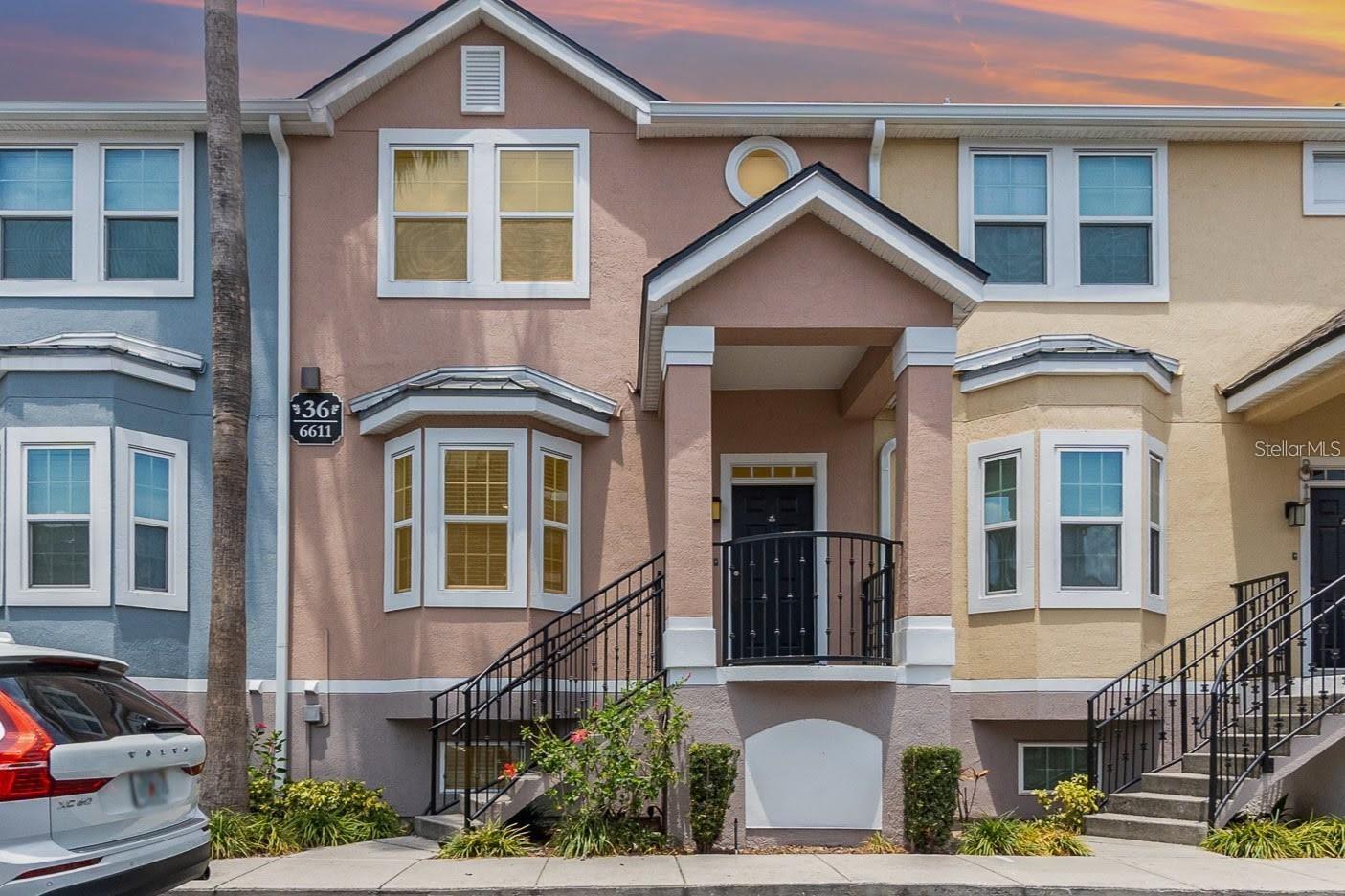 Beautiful 2 bedroom, 2.5 bathroom townhouse-style condo in the gated lakefront community of Hamptons in Metrowest, Orlando! This home has 3 stories and a private 2-car garage! Enter through your private entrance with covered front patio. This is an upgraded unit featuring Granite counters in kitchen and baths, Stainless Steel appliances, luxury vinyl flooring in main living spaces, and 2-inch faux wood blinds on all windows. First floor features a private 2-car garage, and large laundry room with utility sink and washer/ dryer included. Second floor features an open floor plan offering a huge living room with window seat, dining area, kitchen with lots of cabinets and breakfast bar, plus a half bath. Third floor features spacious primary bedroom with full en-suite bath, second bedroom and full bath, plus a built-in study desk/home office nook. Both bedrooms have walk-in closets, and both baths have tub/shower combo. There are loads of resort-style amenities at the Hamptons including two pools with spas, numerous BBQ’s and picnic tables, car wash area, 4000 sqft Fitness Center with lockers/showers, full-court basketball & volleyball court, Resident’s Club with billiards, gated community with 24-hour guard controlled access, park with lakeside gazebo, walking/jogging trail that overlook Turkey Lake, dock for residents to enjoy fishing or watching the sunset, and a boat ramp for small non-motorized craft to launch into the Lake. The two-acre Town Square at the community entrance offers a beautiful park with benches, restaurant, market, business center, and on-site management offices... all for convenience without leaving the neighborhood. Conveniently is also just minutes from premier entertainment, shopping, and dining… and offers proximity to everything you need plus easy access to the Turnpike, 408, and I-4.