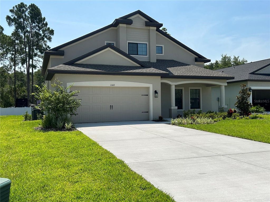 Photo of 11468 Weaver Hollow Road, New Port Richey, FL 34654 (MLS # TB8428124)