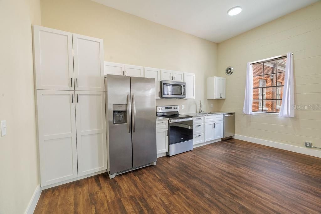 Photo of 306 W Wisconsin Avenue #212, Deland, FL 32720 (MLS # V4948686)
