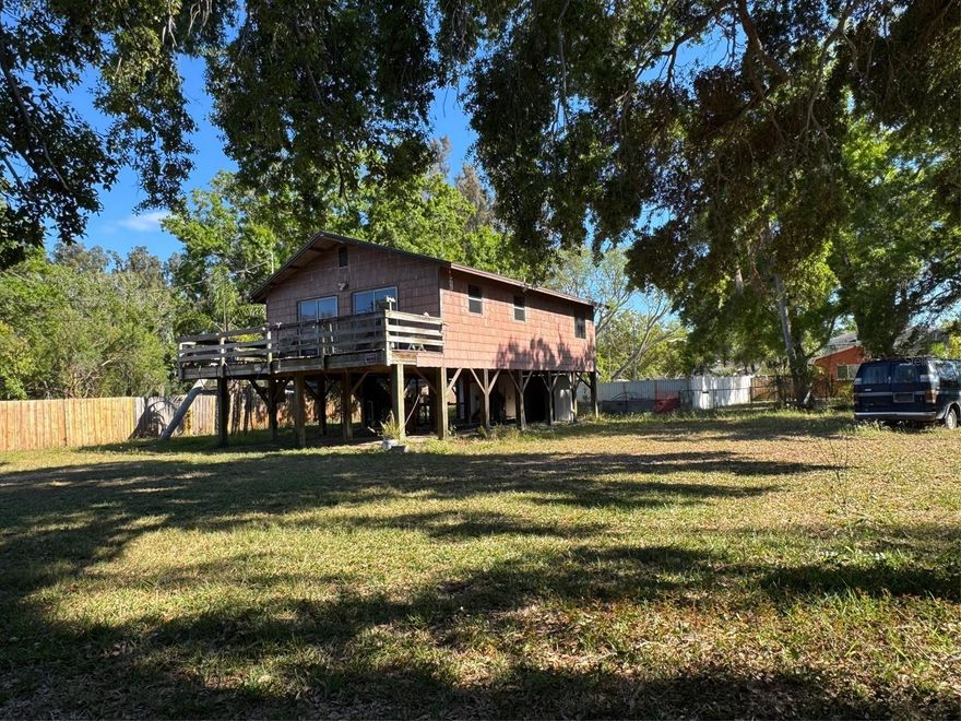 REHAB OPPORTUNITY stilt home near Tampa Bay in Clearwater on oversized lot. Great potential here. Improve in place or clear the lot and build something new. SPECIAL NOTE: NO BLIND OFFERS. CASH ONLY. NO INSPECTION CONTINGENCY WILL BE ACCEPTED. Everything on the property is sold as-is, where-is.  Last roof permit was 2011.