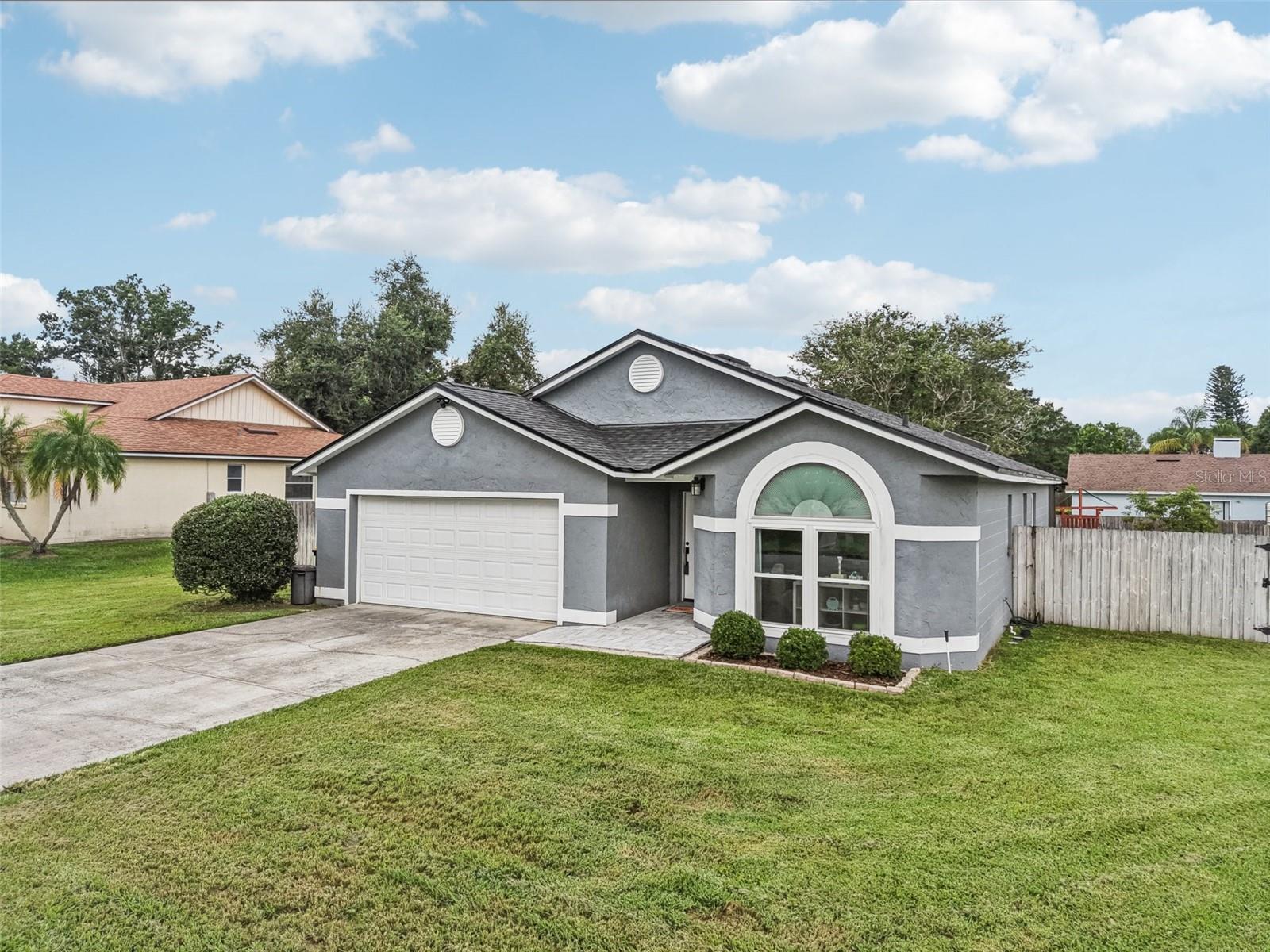 Don’t Miss This Tastefully Remodeled Home Offering 3BR/2BA + Study / Flex Room! Located in SE Lakeland on a Quiet Cul de Sac homesite. This Lovely Home Offers a Gorgeous Kitchen Featuring Beautiful White Cabinetry, Granite Countertops, Tile Backsplash & Stainless Steel Appliances. The Master Bathroom has also been Tastefully Remodeled with Beautiful Floor & Shower Tile, White Cabinet Vanity, Lights & Plumbing Fixtures. The Home also Offers Updating Lighting & Fans Throughout, Luxury Vinyl Plank Flooring, Vaulted Ceilings, All New Interior & Exterior Doors, Trim & Hardware, Insulated Double Pane Windows, 5 ¼” Baseboards. The Outdoor Living Space is Very Spacious Featuring a Large 29’ X ’12 Screened Lanai with Pavers, Storage Shed & a Large Fenced Backyard with Irrigation! Additional Updates Include New Double Pane Windows Throughout '23, New Roof ’22, New Hot Water Heater ’22, New AC System ’20. Septic Tank was just pumped Nov. ’24. Enjoy all that Lakeland has to offer including a thriving downtown, many outdoor parks for hiking, biking & exploring, many lakes, golf, tennis & pickle ball not to mention many tasty restaurants and shopping!
