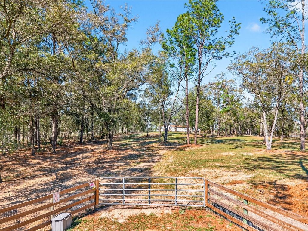 Photo of 10427 NW 8th Lane, Ocala, FL 34482 (MLS # O6384982)