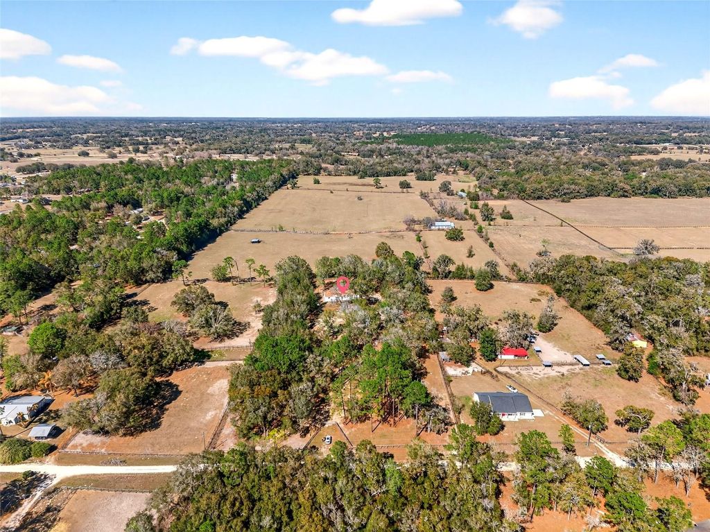 Photo of 10427 NW 8th Lane, Ocala, FL 34482 (MLS # O6384982)