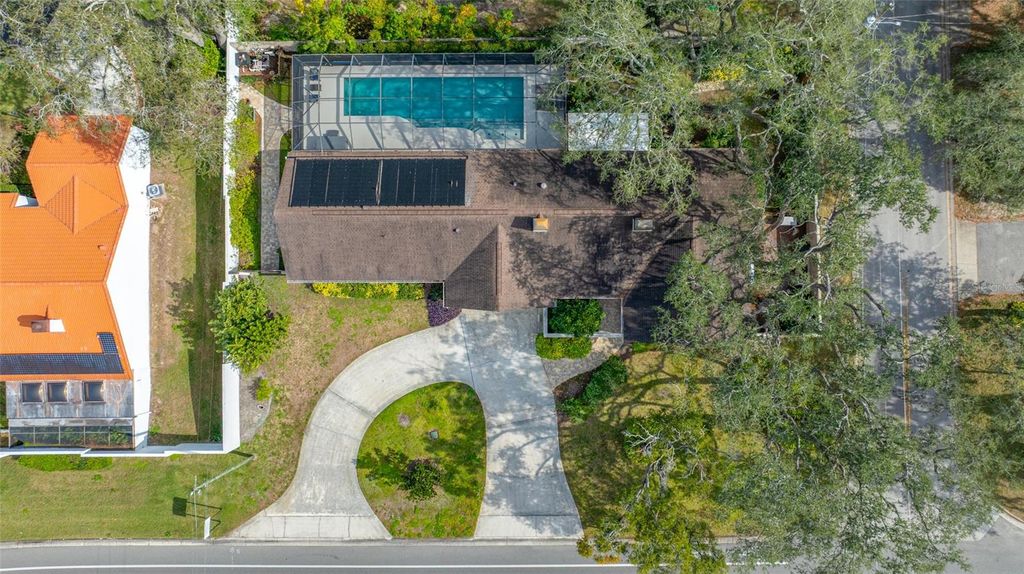 Photo of 1813 N Riverhills Drive, Temple Terrace, FL 33617 (MLS # TB8465345)