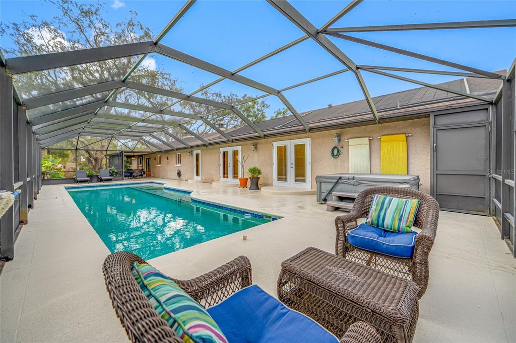 Photo of 1813 N Riverhills Drive, Temple Terrace, FL 33617 (MLS # TB8465345)