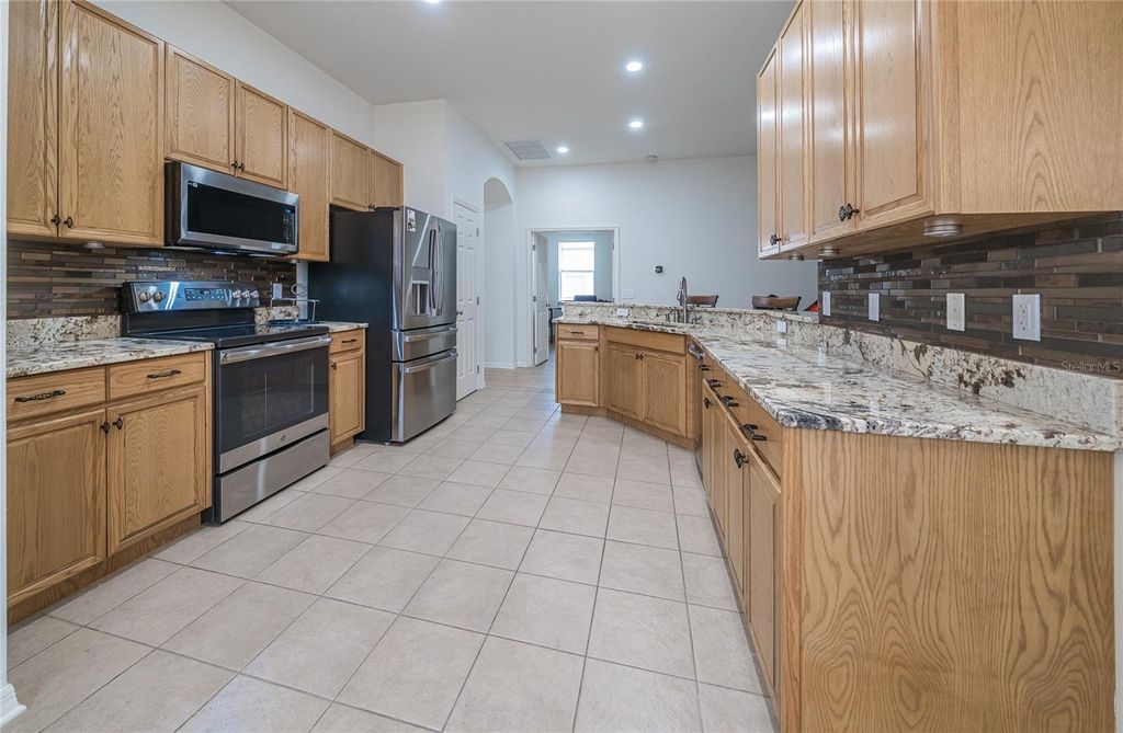 Photo of 31656 Marchester Drive, Wesley Chapel, FL 33543 (MLS # TB8468347)