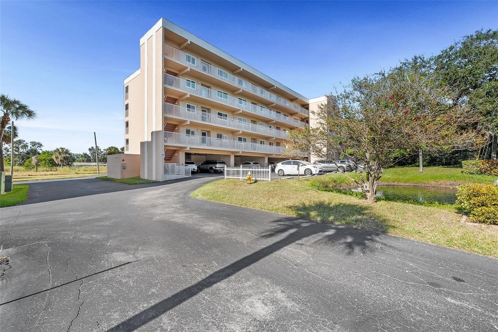 Photo of 9510 Harbor Greens Way #305, Seminole, FL 33776 (MLS # TB8443453)