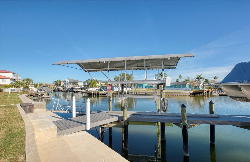 Build your waterfront dream home on this exceptional Gulf-access lot—just a 3-minute idle to open Gulf waters, with no bridges and true deep water. This property is fully prepared for construction and enjoyment from day one.
Your private marina is already complete, featuring:
Two 13,000-lb covered boat lifts Large floating dock + small floating dock,Two jet ski ports

Brand-new 84' concrete seawall Utilities are ready to go with water, sewer, and electric already installed, and the geological report is done—bring your plans and start building immediately.

While your dream home is under construction, enjoy full use of the property: bring your yacht, flats boat, and jet skis and take advantage of the incredible access and amenities.

Located in the desirable Gulf-front community of Hudson, a friendly, golf-cart-approved area known for beautiful sunsets and relaxed coastal living.

With all major groundwork already completed, this rare opportunity can save you hundreds of thousands in prep and build costs.

Opportunities like this don’t last—submit your offer today!