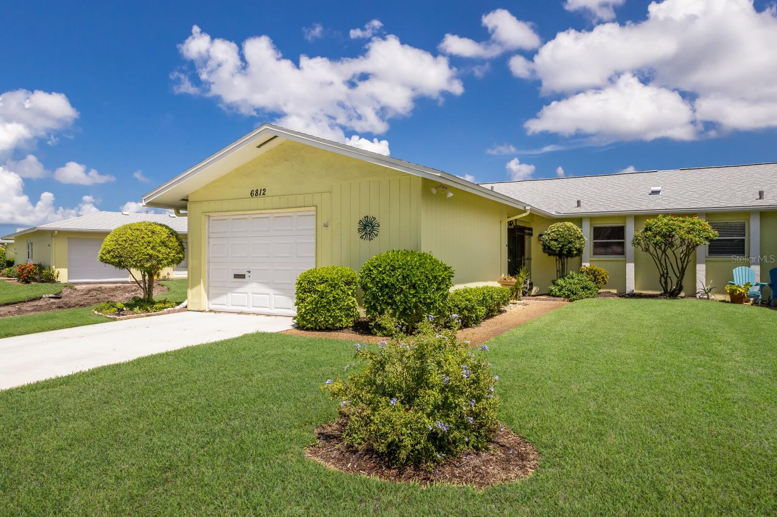 One or more photo(s) has been virtually staged. Live the Laid-Back Florida Dream in Village Green.
Welcome to your slice of paradise in the heart of West Bradenton! Nestled in the highly desirable 55+ community of Village Green and priced to sell, this beautifully updated 2/2 villa-style condo offers the perfect blend of comfort, community, and coastal convenience. Just minutes from the beaches of Anna Maria Island, fine dining, shopping, and medical services—this location can’t be beaten.
Step inside to a bright, open floor plan filled with natural light and serene views of the sparkling community pool steps from your porch. The interior has been freshly painted and accented with elegant crown molding, creating a crisp and stylish atmosphere. This home has been meticulously maintained with major system updates that include:
New roof (2025)
New central A/C system (2024)
New hot water heater (2024)
Upgraded electrical with outside surge protector (2020)
Whether you’re relaxing indoors or enjoying the heated pool just steps from your back door, you’ll love the peaceful setting and sense of community that make Village Green so special.
Section 4 of Village Green is an intimate enclave of just 36 homes, surrounded by lush landscaping, a community gazebo, ramada, and shuffleboard courts. Residents enjoy regular social events like luncheons, happy hours, and gatherings that turn neighbors into lifelong friends.
