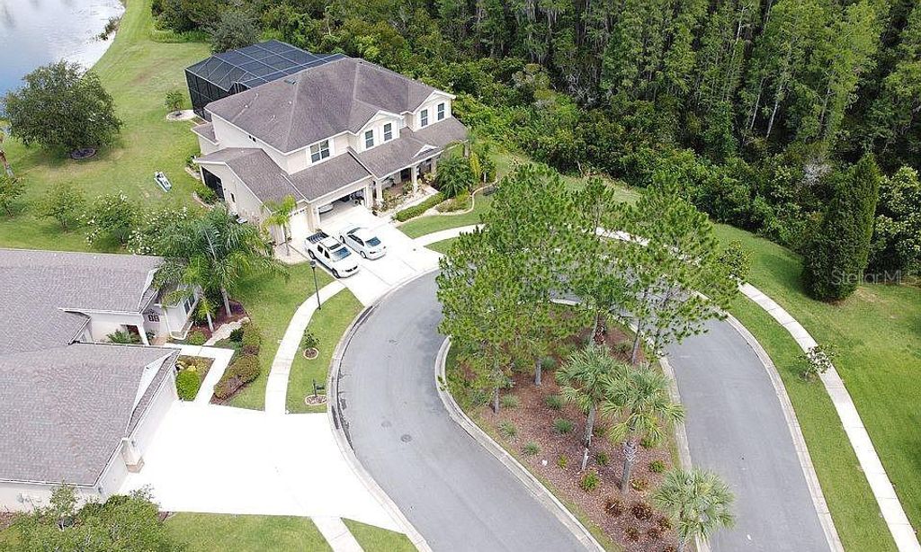 Photo of 10503 Palm Cove Avenue, Tampa, FL 33647 (MLS # O6375153)