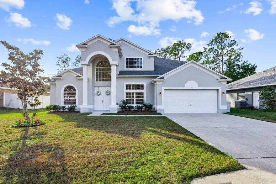 One or more photo(s) has been virtually staged. Bring the entire Family to this spacious two story home in the desirable Pine Lakes area with over 2900 living space with 4 bedrooms, 2 and a half bath and a two car garage and start making memories today. Enter through the double front doors to find a spacious main floor with the oversized master suite on the first floor, with a bonus area that can be used as a nursery, reading nook, office or workout area. There are separate walk in closets.  Upstairs, you will find a large flex area, three bedrooms and a full bathroom with enough space for everyone to retreat to their private space when needed. The home is equipped with new appliances including a coveted gas stove, refrigerator, dishwasher, washer and dryer.  The roof was replaced in 2022, A/Cs were replaced in 2023 and 2024, flooring was replaced in 2023 with luxury vinyl and carpet, the entire interior and exterior were painted in 2023.  There is a screened porch, and the yard offers plenty of space for kids to play, pets to roam, or for setting up a grill and enjoying Florida evenings together.  Pine Lakes is known for its quiet, established feel and central location, keeping you close to parks, shopping, golf courses, walking and bike trails, and Palm Coast's beautiful beaches while still feeling tucked away from the hustle and bustle.  There is plenty of space to add a pool. The City of Palm Coast has been recognized by two national publications for being one of the "7 best places to retire" and among "America's 50 best cities to live in." MONEY magazine, a publication of Time Inc., selected Palm Coast as being "Best for Water Lovers" as part of its retirement feature. The Orlando theme parks are located 90 minutes away, along with the Orlando airport. Jacksonville is an hour away and the Nation's oldest city, St. Augustine is half an hour away. Daytona Beach, home of Daytona International Speedway and Bike Week is half an hour away. Call today for your showing.