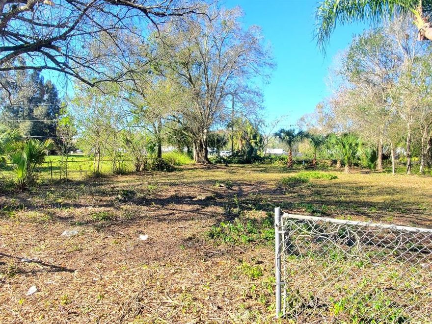 Vacant large corner Lot! Waiting for the right buyer. Recently Cleared. Ready to  build and also approved for placement of Mobile Home. No HOA. No Flood zoned.  Fenced. Walking distance from Hwy-70. Centrally located closed to restaurants, shopping centers, local jobs, great schools and Lake Okeechobee. Mature trees for shades. Call before it is gone. Make it yours today !
