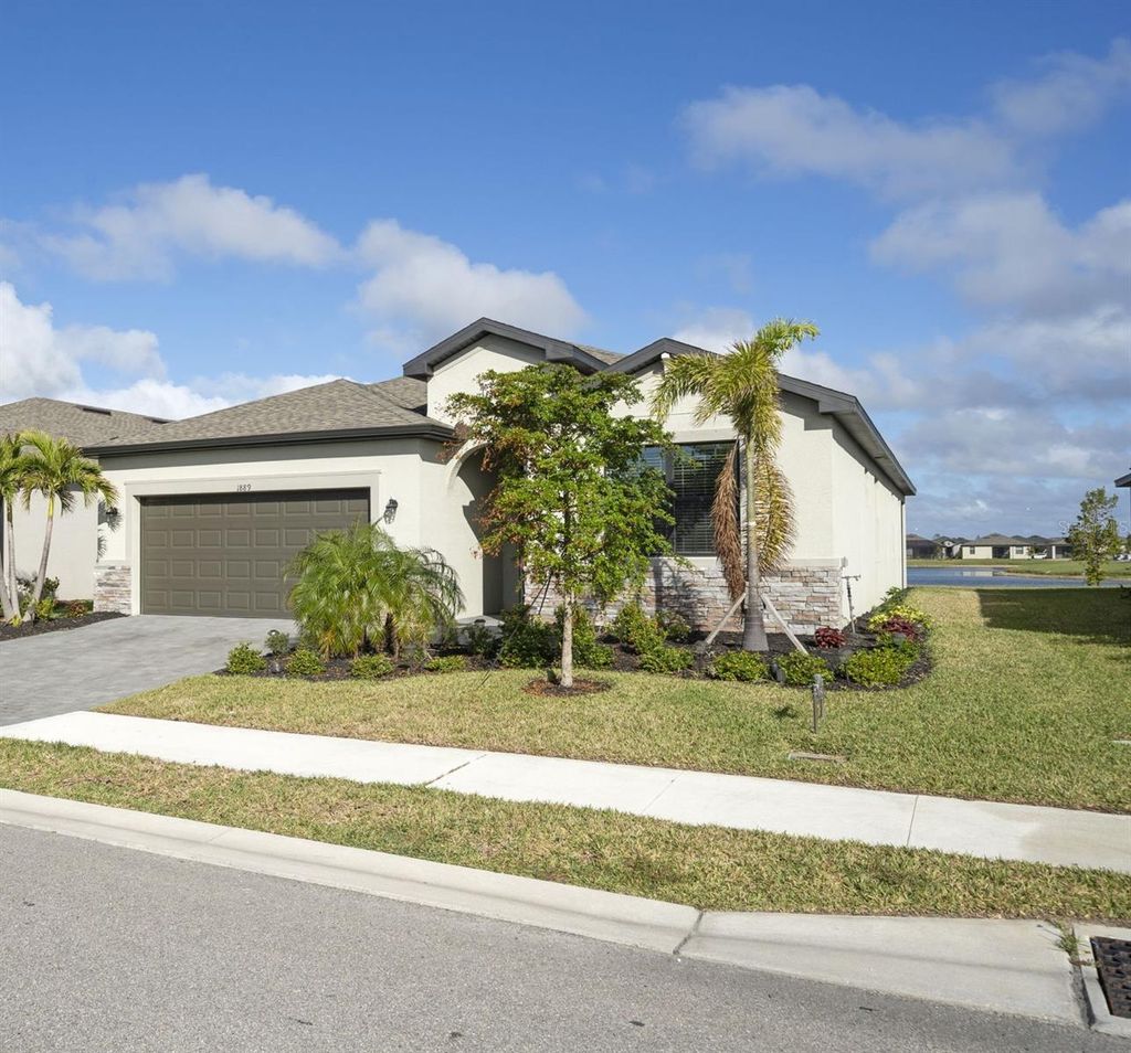 Photo of 1889 Saddlewood Cir, Port Charlotte, FL 33953 (MLS # A4688769)