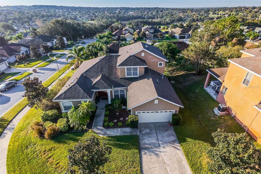 MOVING READY. This immaculate two story home is located in the community of Bent Tree in the heart of Clermont close to shopping, restaurants, hospital. This 4 bedrooms 2 1/2 baths is moving ready with new roof (2023) newer HVAC system 2022, wood like ceramic tiles and luxury vinyl floors throughout entire house. The open floor plan boast an upgraded kitchen with wood cabinets, stainless steel appliances, spacious family room and breakfast nook. The amazing views from all the rooms witch brings in the natural light to make this house bright and airy. The first floor includes the Owners suite with double walking closet, large double sink vanity, soaking tub and separate walk in shower and a large linen/storage shelving closet. You will also find the formal dining room and formal living the an amazing view thru the sliding doors that connects to the outdoor cover porch. The back yard has a mature landscaping that includes fruit trees like avocado, guava, bananas, guanabana etc. As part of the fist floor you also have a Powder room, laundry and 2 car garage. On the second floor you find all the other 3 spacious bedrooms and guest bath all with luxury vinyl wood like floors.