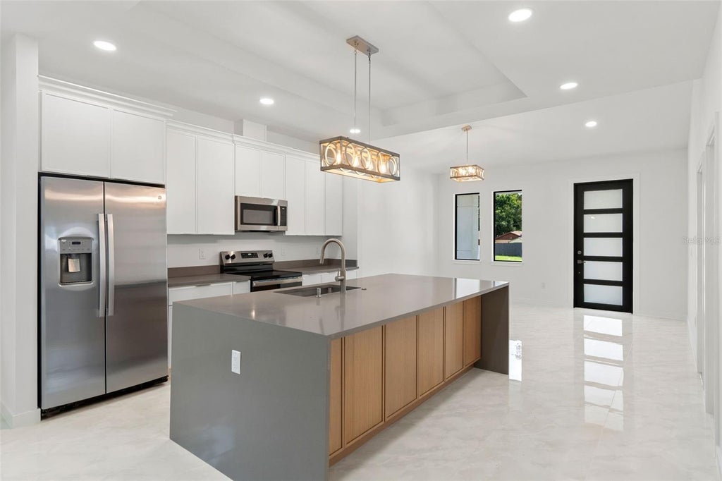 Photo of 8522 N Ashley Street, Tampa, FL 33604 (MLS # TB8549016)