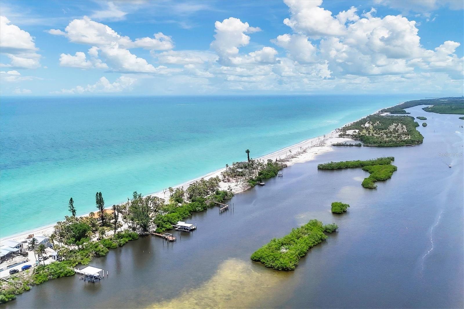 This rare and exceptional parcel of vacant land offers direct Waterfront access to the stunning Gulf of Mexico, providing unparalleled opportunity to own a piece of Florida's most coveted coastline. Build you coastal retreat on this private property which delivers the perfect blend of natural beauty and convenience with 184 feet on the Gulf of Mexico, plus your private boat dock, makes this the perfect retreat to build your custom home.
Located on the North end of Manasota Key, private and gated, close to local restaurants, shopping and golf coursed. Sarasota, Tampa and Fort Myers airports are a short drive away. Current home is scheduled to be torn down in the next 30 days.