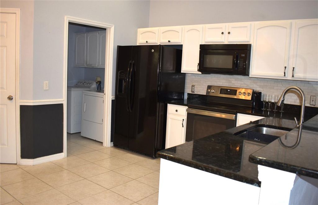 Photo of 436 Lake Shore Parkway, Davenport, FL 33896 (MLS # O6390119)