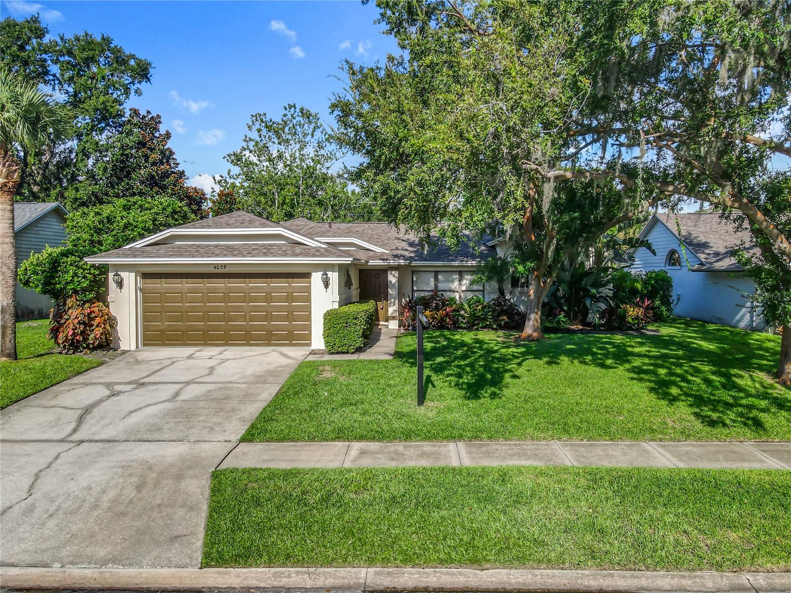 You don't want to miss out on this fabulous rental property sitting directly adjacent to the Palmer College of Chiropractic Florida Campus, in the desirable Countryside community! Perfect for Families, Professionals, and Roommates. This beautiful home features a spacious 3-bed, 2-bath split floor plan, offering privacy and functionality for any lifestyle. The owner's suite includes oversized walk-in closets, while the entire home boasts brand-new laminate flooring and a new roof, ensuring both comfort and peace of mind. Cathedral ceilings elevate the great room, complemented by bright, open living spaces—perfect for entertaining. The large kitchen overlooks the serene backyard and connects seamlessly to the temperature enclosed back patio, ideal for relaxing or enjoying outdoor gatherings. Located just 10 minutes from the beach, you'll also enjoy close proximity to top-rated restaurants, fitness centers, and local shops. Includes access to a community pool and clubhouse, only a short walk away. Homes in this area lease quickly—schedule your tour today and make this beautifully updated property your next home!