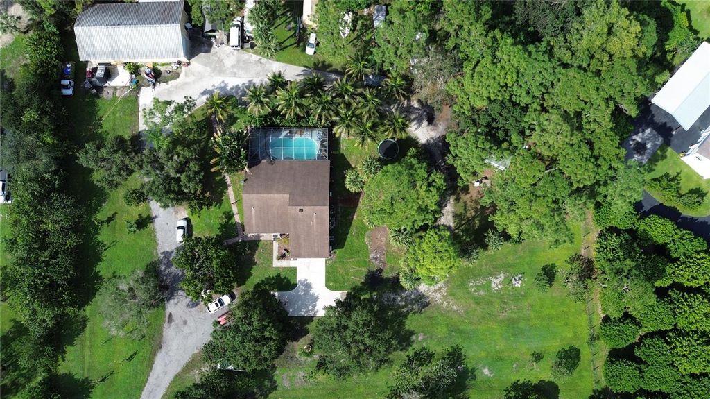 Photo of 9795 Whippoorwill Trail, Jupiter, FL 33478 (MLS # L4956418)