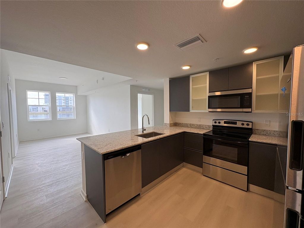 Photo of 5587 Millenia Park Blvd #121, Orlando, FL 32839 (MLS # O6384812)