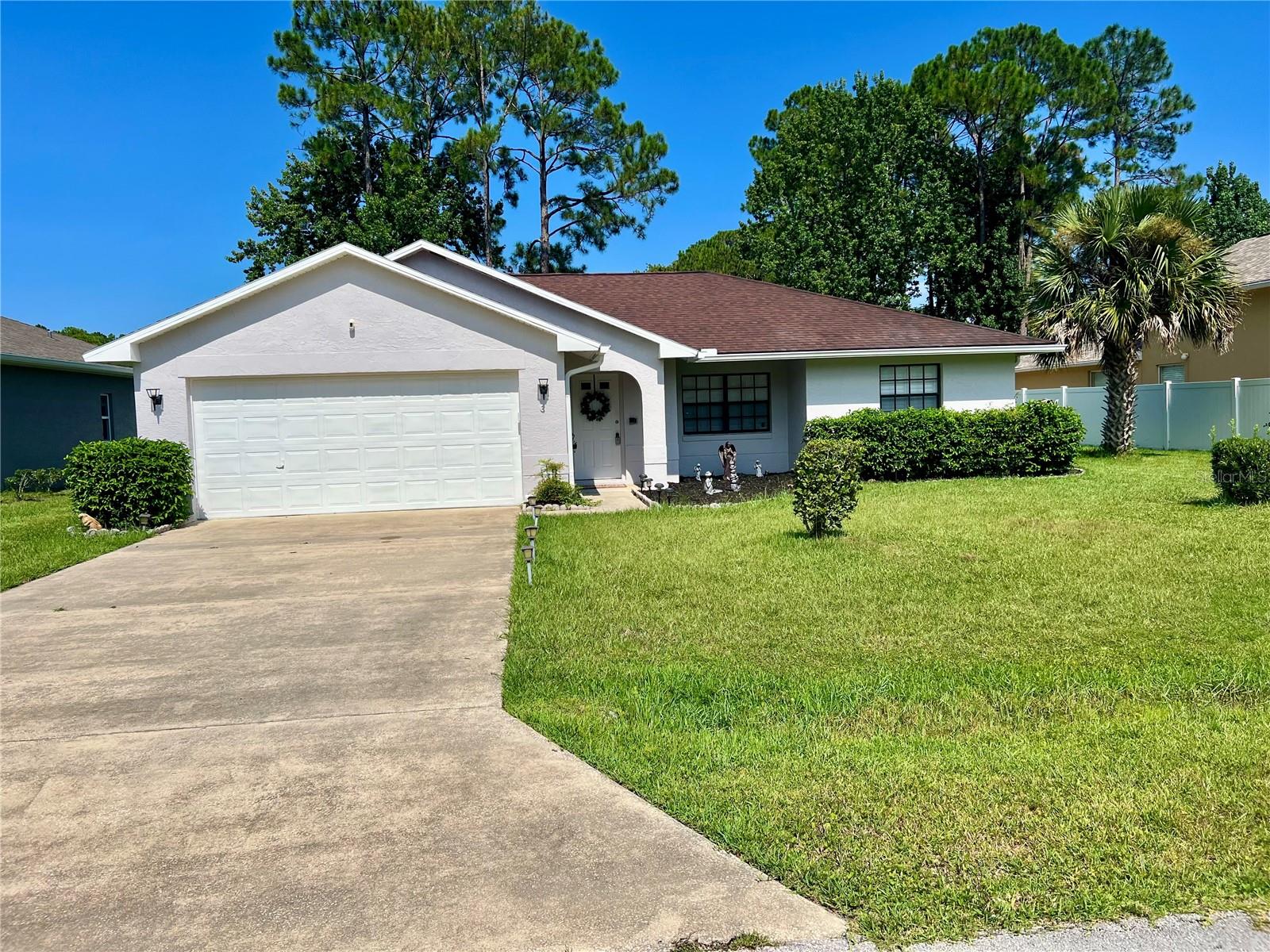 Welcome to this charming 3 bedroom, 2 bathroom home located at 6 Willow Grove Place in Palm Coast, FL. This property features a spacious 2-car garage, freshly painted interior and exterior, and a comfortable layout perfect for everyday living. The open living area offers plenty of natural light, while the kitchen provides ample cabinet and counter space. The primary suite includes its own private bathroom, and the additional bedrooms are generously sized. Enjoy the convenience of being close to schools, parks, shopping, and the beach.